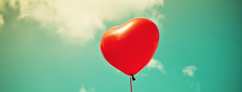 Corazón rojo ascendiendo - Top Family